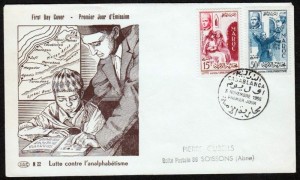 Premier Jour avec tableau d'enfant apprenant à lire 2 timbres cachet fait à Casablanca